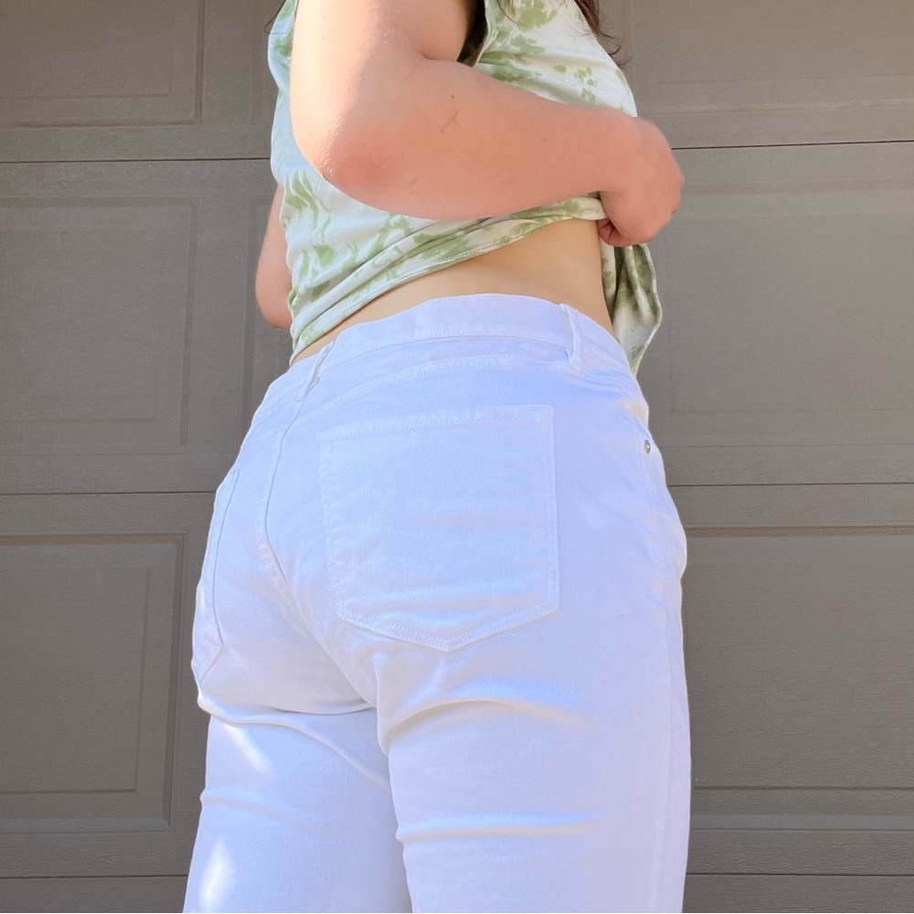 white ann taylor flare jeans 🤍 mid to low rise essential!!